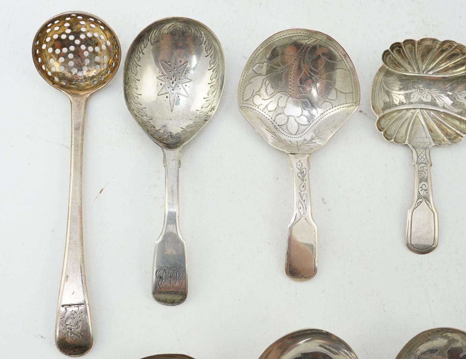 Ten assorted manly 19th century silver caddy spoons